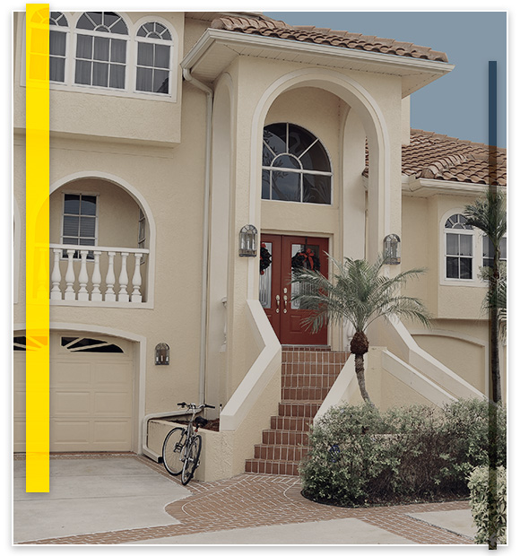 stucco house with red front door